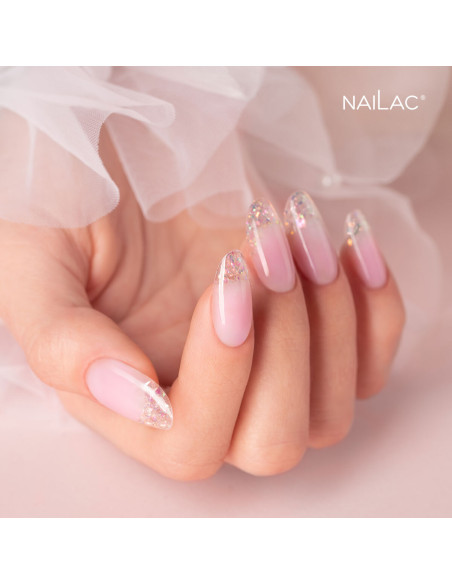 Manicure żelowy. Paznokcie ozdobione przezroczystym żelem w butelce z drobinkami holo - Jelly Bottle Confetti