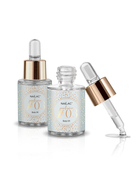 Dwie buteleczki z perfumowanymi oliwkami do skórek #03, jedna odkręcona z pipetką opartą o brzeg butelki