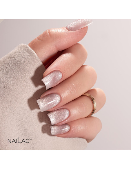 Manicure hybrydowy wykończony topem Cat Eye z magnetycznymi drobinkami z efektem flash