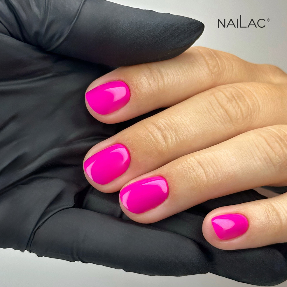 Manicure hybrydowy. Paznokcie pomalowane neonowym różowym lakierem #465