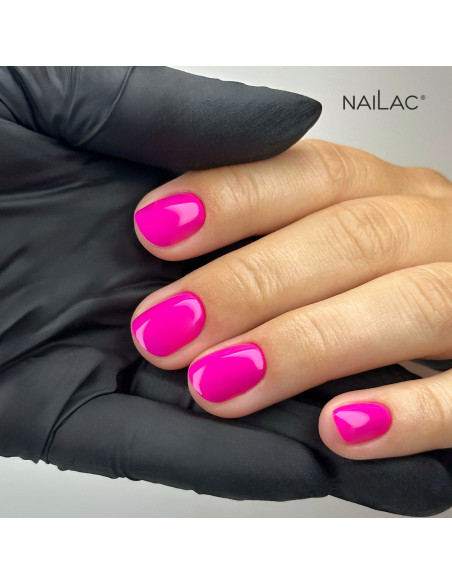 Manicure hybrydowy. Paznokcie pomalowane neonowym różowym lakierem #465