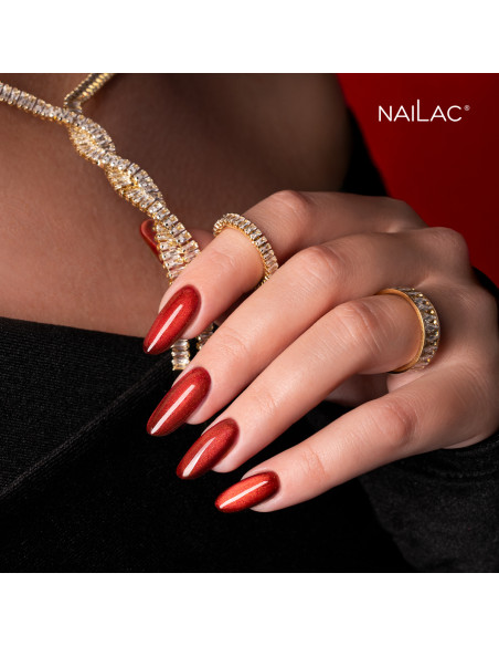 Czerwone paznokcie hybrydowe z efektem Cat Eye