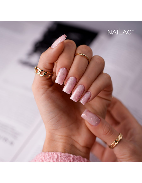 Manicure hybrydowy - stylizacja wykonana za pomocą bazy kauczukowej Glammy Base Milk&Purple